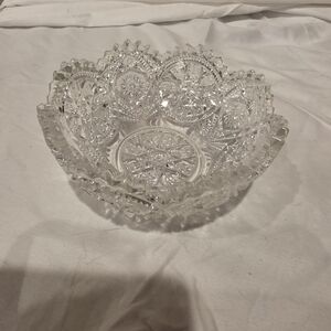 Imperial Glass Co. Vintage bowl with sawtooth edge and star and arches pattern.